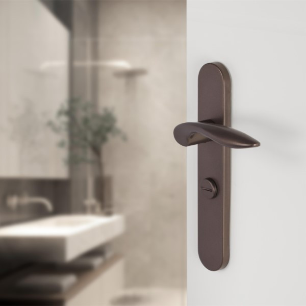 Differnz Deurklink met wc-sluitingschild | Differnz | Groningen | 63 mm (Ovaal, RVS, Brons) 86.023.54 K010830410 - 2